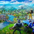 Fortnite regresa a Google Play: una victoria después de años de guerra legal. a screenshot from the video game Fortnite. three characters sit or stand on top of a mountain around a purple lowrider car while staring down at the land below