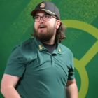 Campeón de Pokémon Go desafiado: Desafía la descalificación tras una victoria explosiva. A Black man with a goatee wears a black t-shirt and is staring at the camera.